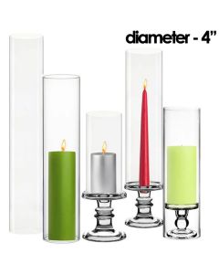 Our various Glass Hurricanes Chimney Tubes size options are displayed alongside both votive candles or standard taper candles atop our glass candle holders
