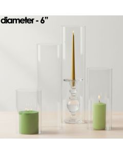 Our various Glass Hurricanes Chimney Tubes size options showcased alongside both votive candles or standard taper candles atop our glass candle holders