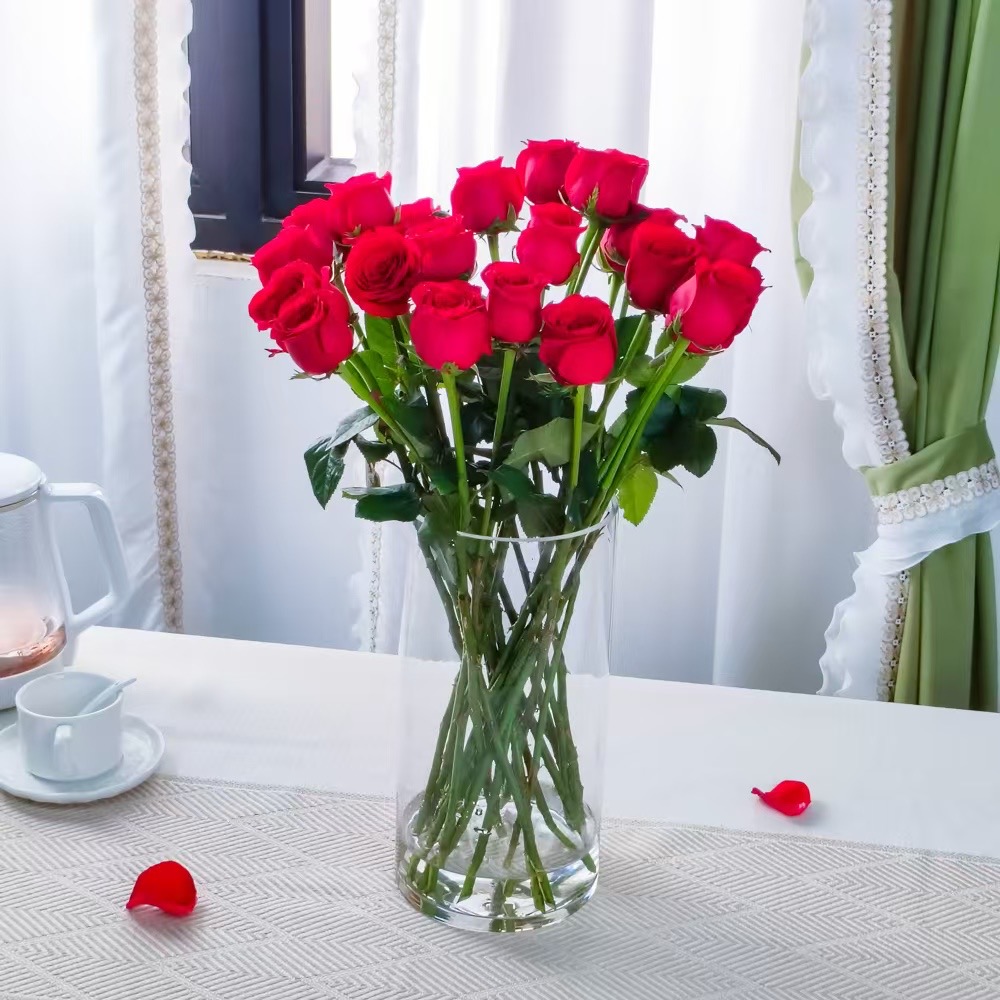 24 roses in cylinder vase